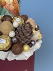 Шляпная коробка с виноградным напитком