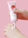 Солнцезащитная сыворотка с коллагеном и экстрактом камелии Round Lab