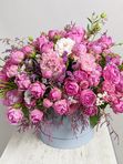 Composition with roses in a blue box