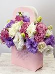 Eustoma in a handbag