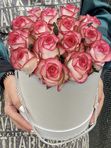 15 pink roses in a white box