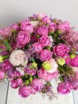 Composition with roses in a blue box