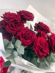 9 roses with eucalyptus