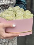 12 white roses in a pink box