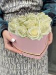 12 white roses in a pink box