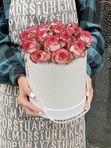 15 pink roses in a white box
