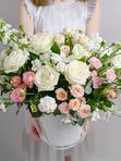 Composition with roses in a white box