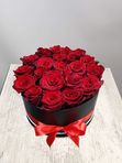 21 red roses in a black box