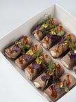 Рулетики из языка и сливочного мусса с хреном