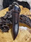 Нож с рукоятью из клыка моржа, дерева и зуба медведя