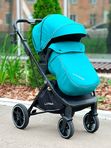 Коляска прогулочная Luxmom 740 с реверсивным блоком, Изумрудная (черная рама) + рюкзак