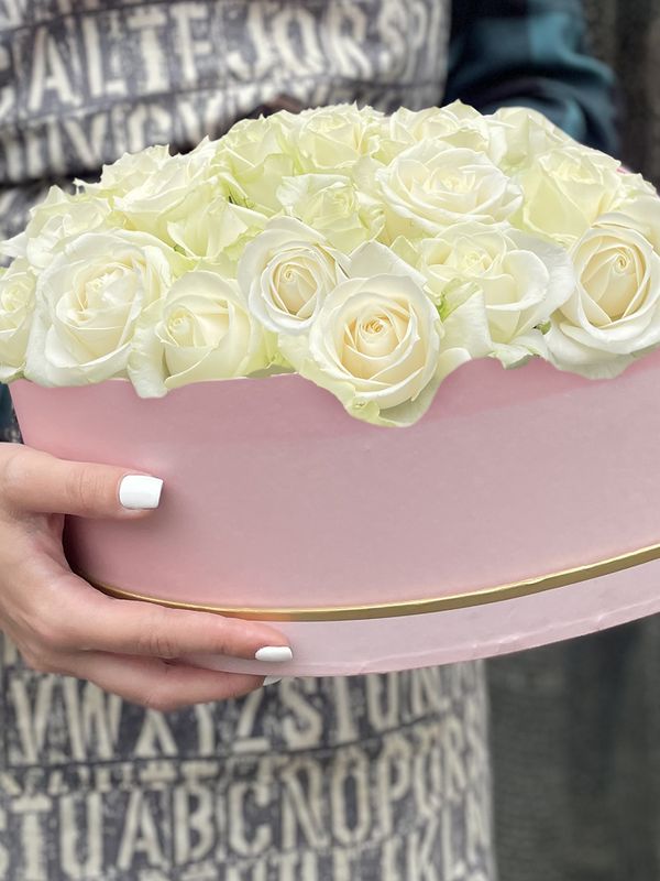35 white roses in a pink box