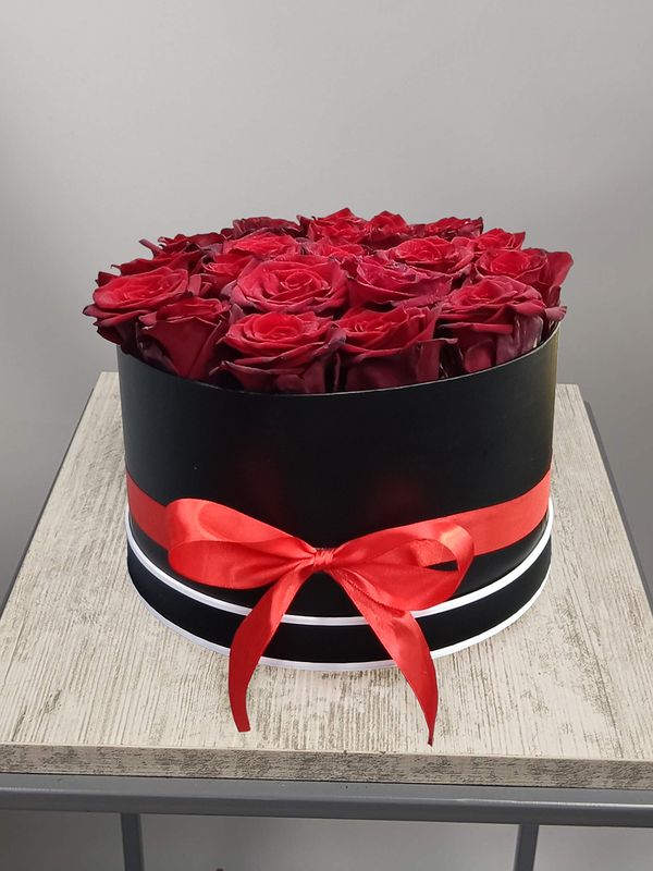 21 red roses in a black box