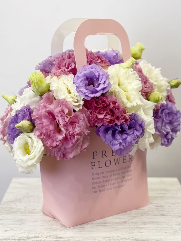 Eustoma in a handbag