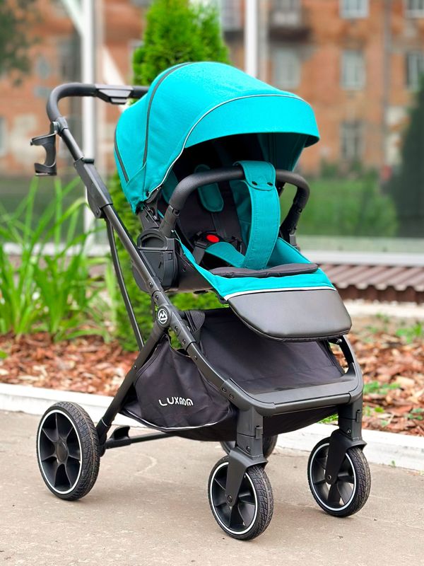 Коляска прогулочная Luxmom 740 с реверсивным блоком, Изумрудная (черная рама) + рюкзак