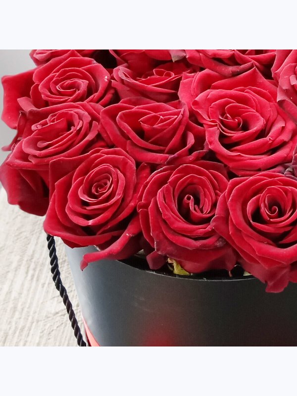 21 red roses in a black box